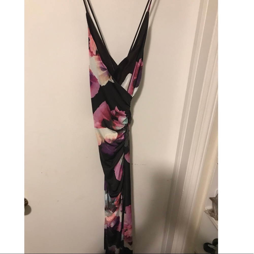 Brand new, beautiful lace up in back maxi dress.